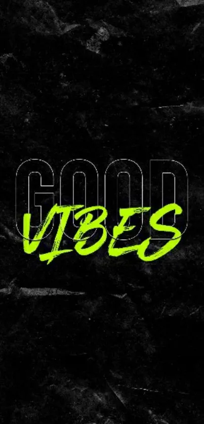 Neon 'Good Vibes' text on black background.