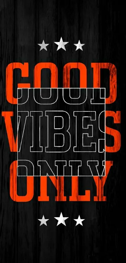 Good Vibes Only text on black wood background.