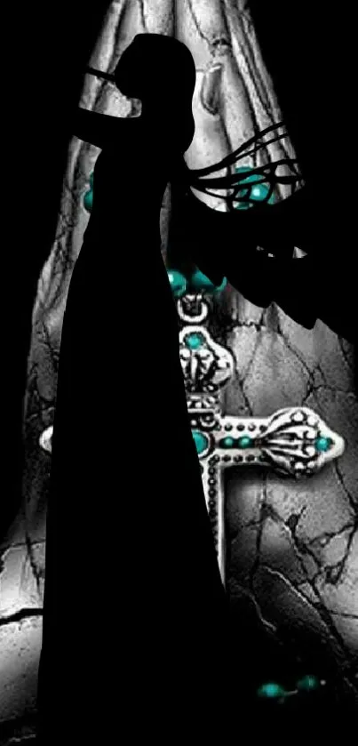 Silhouette of a gothic angel with a turquoise jeweled cross on a black background.