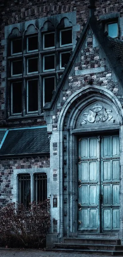 Gothic building with large wooden door, showcasing intricate stonework and vintage design.