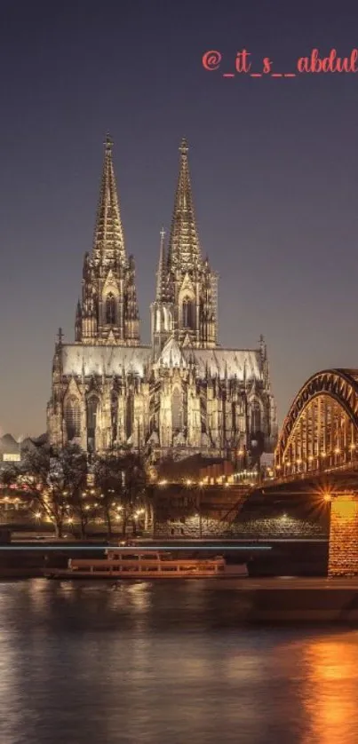 Gothic cathedral with night lights reflected in a calm river, perfect for mobile screens.