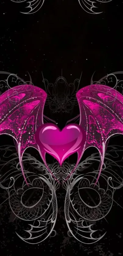 Gothic wallpaper with pink heart and intricate wings design on dark background.