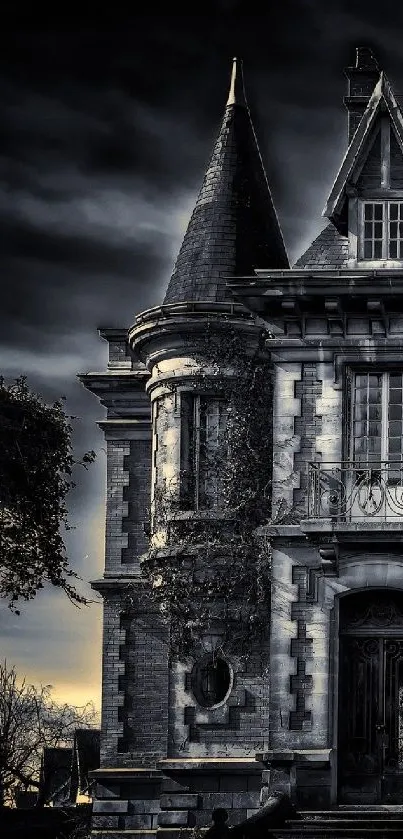 A gothic mansion stands under a dark, stormy night sky, creating an eerie scene.