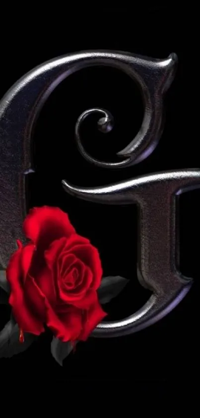 Gothic style metallic letter G with a red rose overlay on a black background.