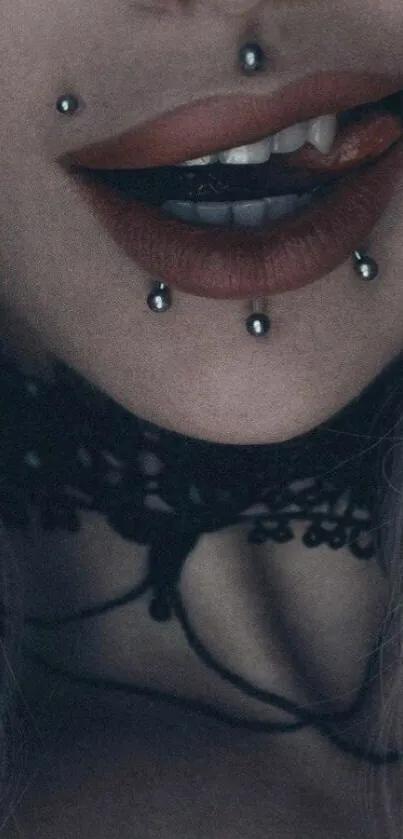 Gothic aesthetic wallpaper with vampire theme and piercings.