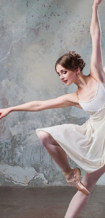 Graceful ballerina performing against a textured gray background.