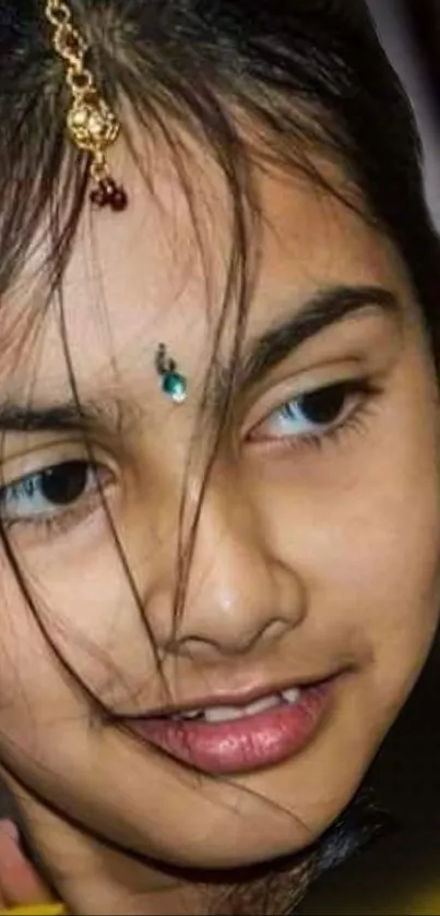 Close-up portrait of a young girl with elegant jewelry.