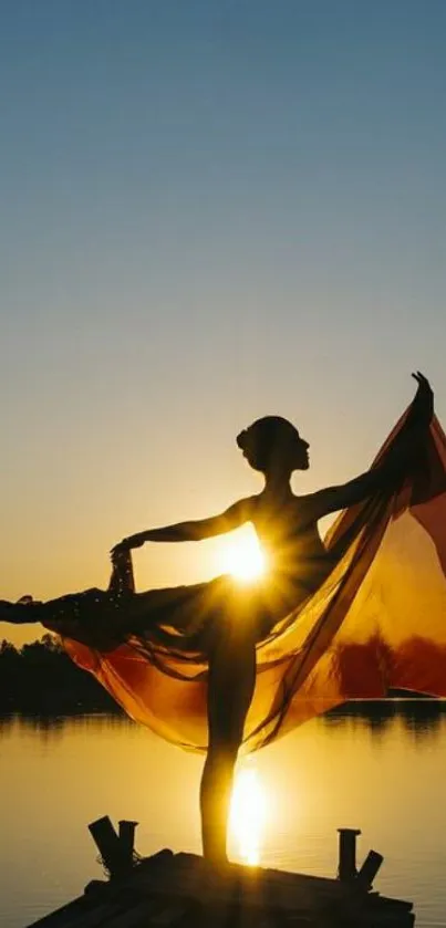 Silhouette of a dancer at sunset on a lakeside.