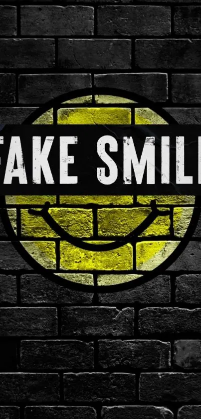 Yellow graffiti smiley on dark brick wall with 'fake smile' text.