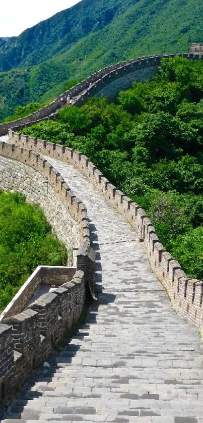 Majestic Great Wall of China amidst green mountains.