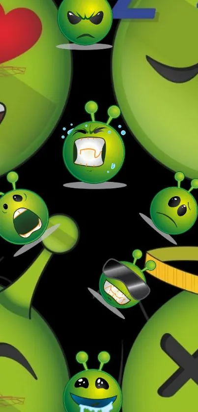 Green alien emojis with fun expressions on a black background wallpaper.