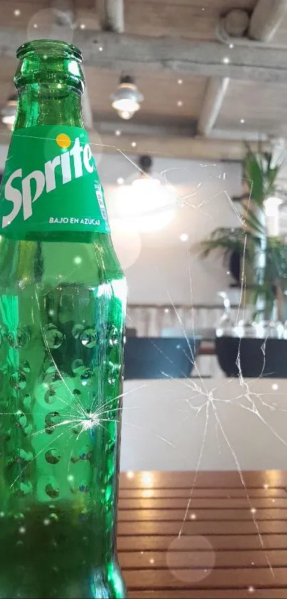 Green Sprite bottle on wooden table in cafe setting.