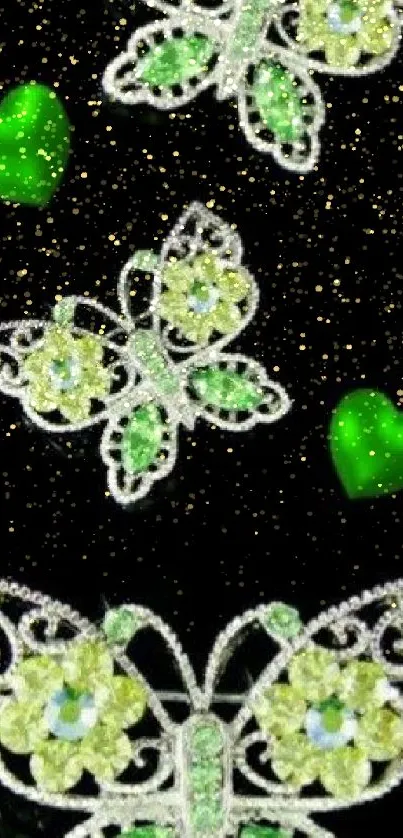 Green jeweled butterflies and hearts on black background.