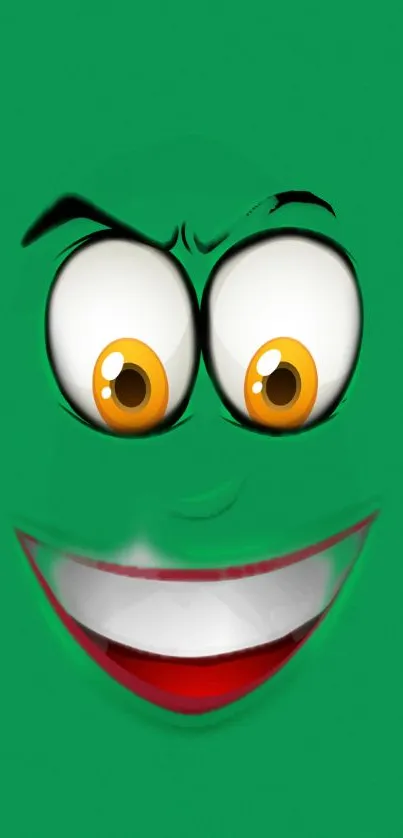 Playful green cartoon face with bright eyes and a wide smile on a mobile wallpaper.