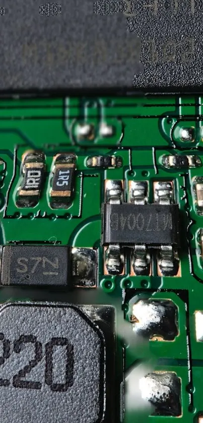 High-resolution close-up of a green circuit board with detailed components.