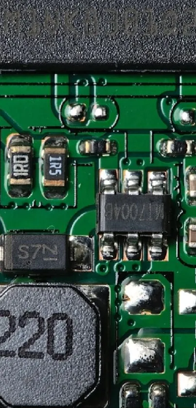 Closeup of green circuit board with components