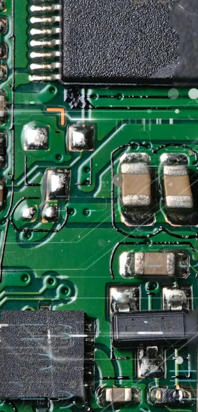 Intricate green circuit board wallpaper featuring electronic components.