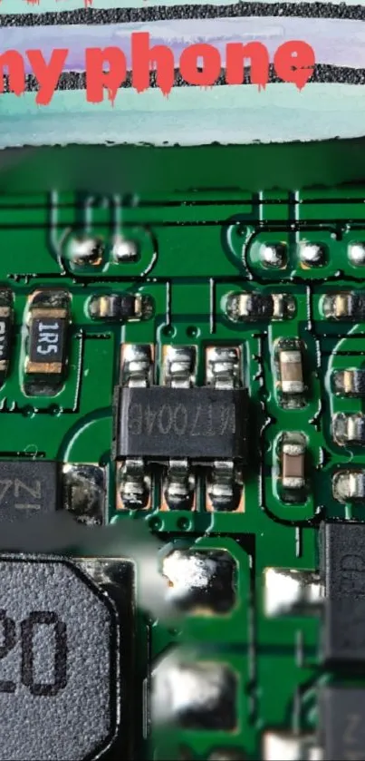 Close-up of green circuit board wallpaper with intricate details.