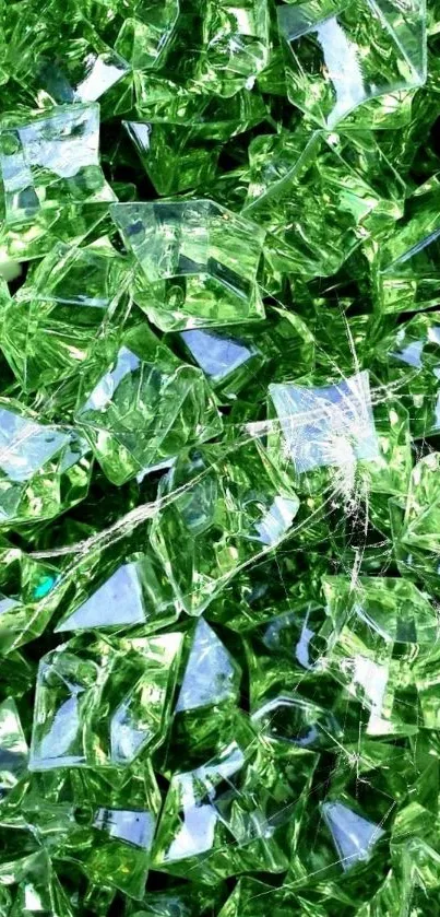 Green crystal shards forming a textured and vibrant mobile wallpaper background.