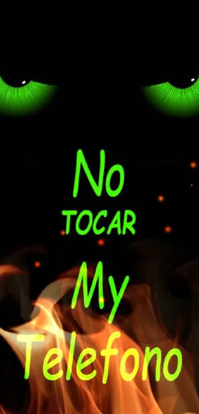 Wallpaper with glowing green eyes and a warning text in Spanish.