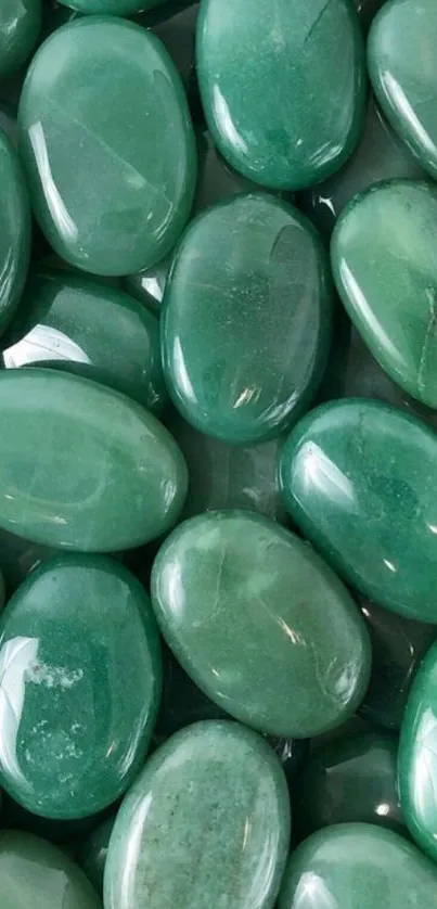 Emerald green gemstones clustered together.