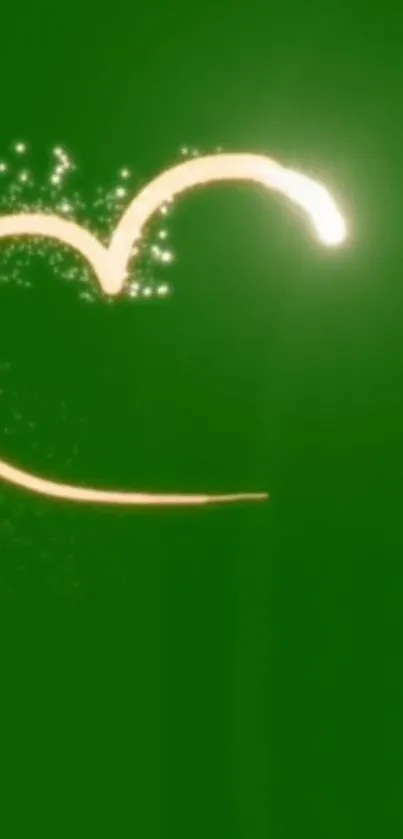 Glowing heart on green background wallpaper