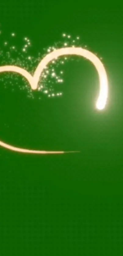 Green wallpaper with a glowing heart and sparkles.