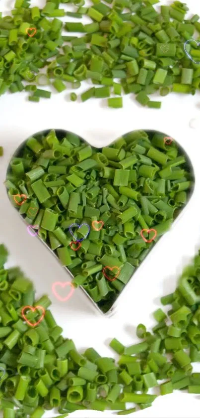 Green herbs forming a heart shape on a white background.