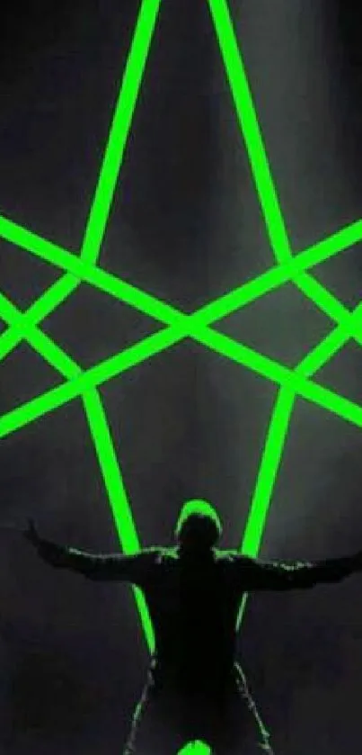 Silhouette in front of a large neon green star.