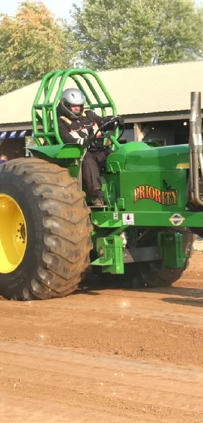 Green tractor pulling on dirt track before a crowd.