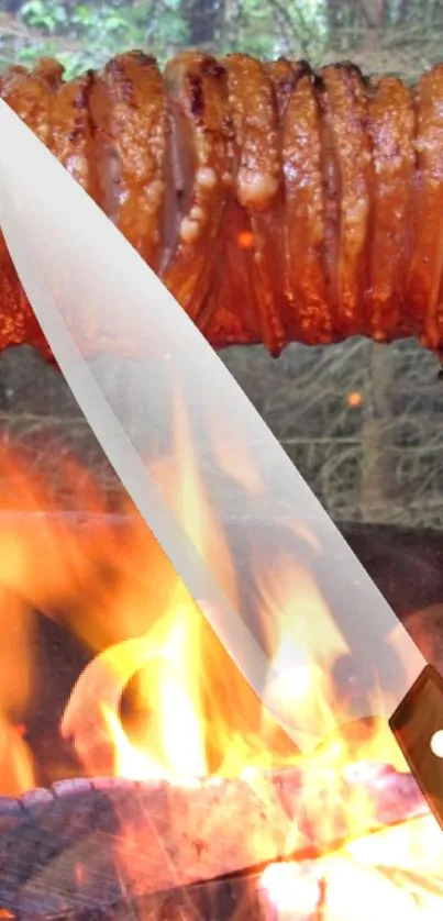 Grilled meat and knife amidst vibrant flames.