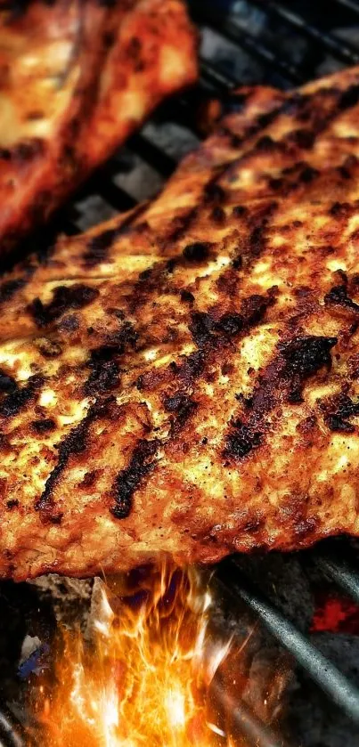 Grilled meat sizzling on a barbecue grill.