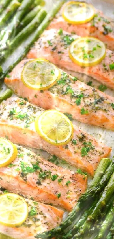 Grilled salmon with lemon and asparagus on a baking sheet.