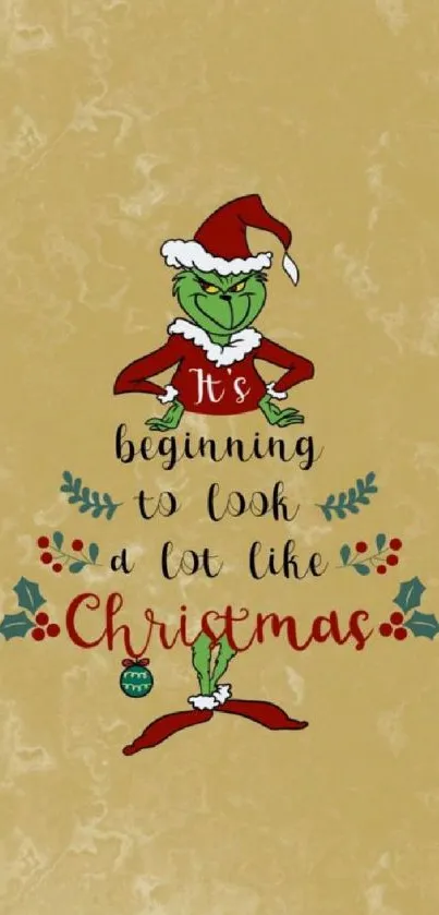 Grinch in Santa hat with Christmas quote on gold wallpaper.