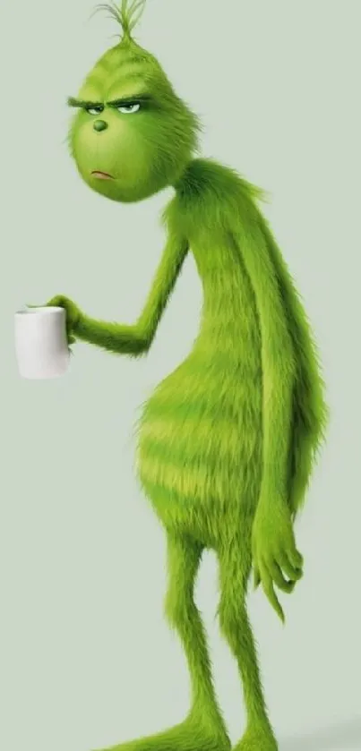 Cartoon Grinch holding a coffee cup on a light green background.