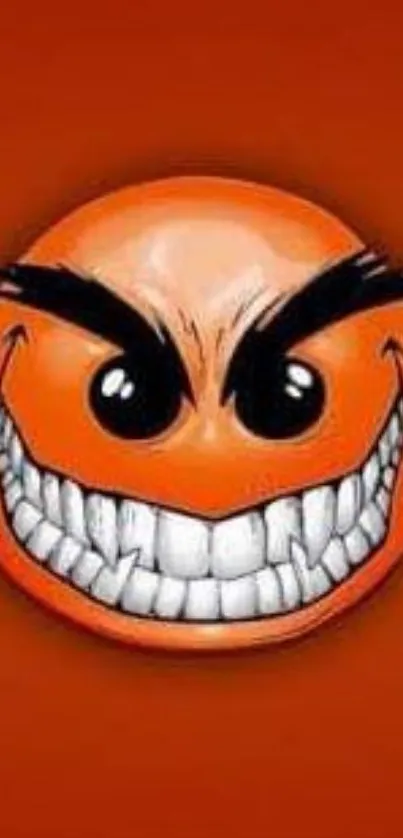 Grinning orange emoticon with sharp teeth on an orange background wallpaper.