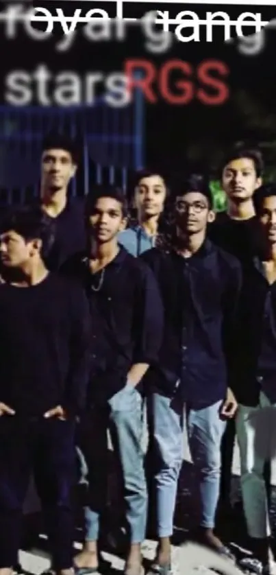 Group of young friends standing together with dark casual outfits.