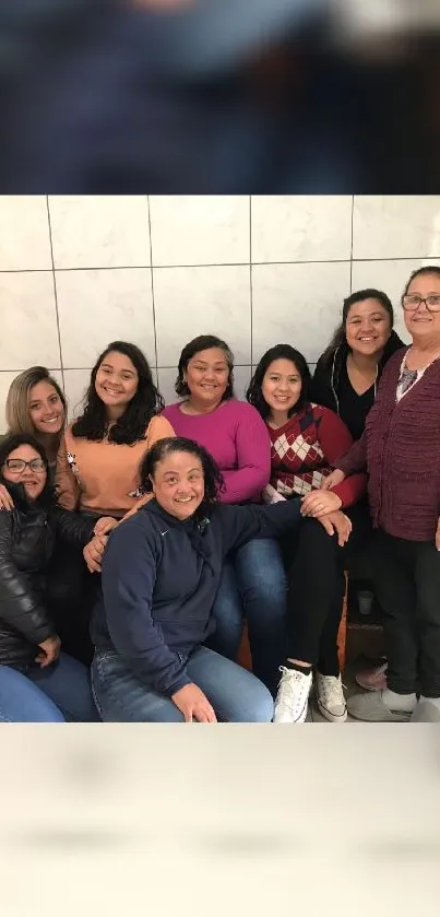 Group of friends posing in a kitchen.