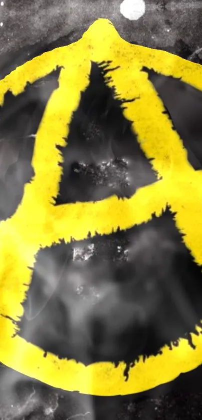 Yellow anarchy symbol on dark smoky background wallpaper.