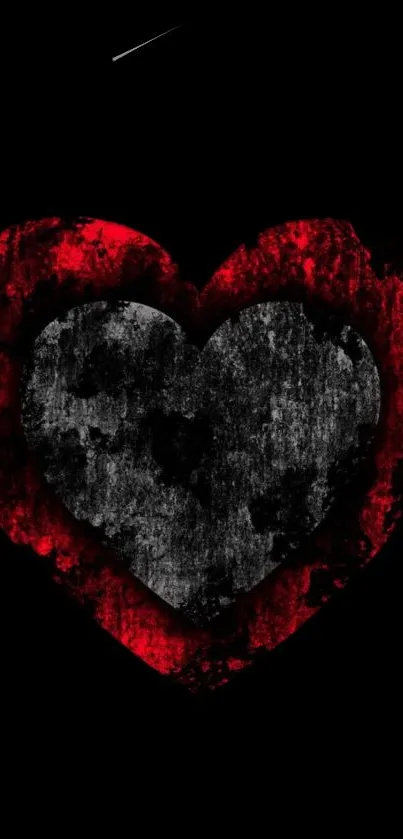 Grunge heart design with red and black hues on a mobile phone wallpaper.