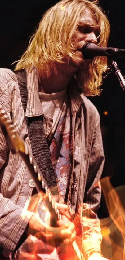 Grunge guitarist performing live on stage.