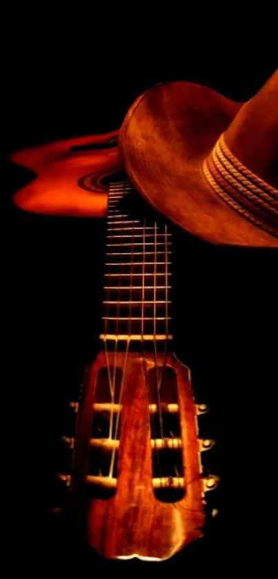 Artistic wallpaper featuring a guitar and cowboy hat on a dark background.