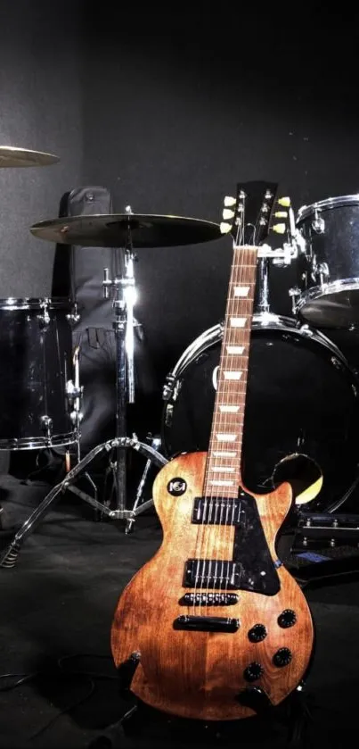 Classic guitar and drum kit on a black background.