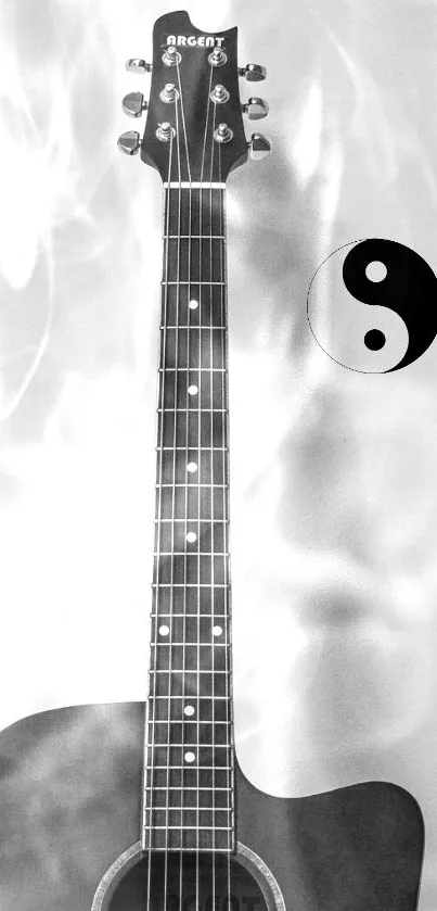 Black and white guitar with Yin Yang symbol art.