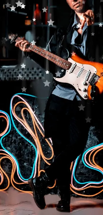 Guitarist playing with neon lights backdrop.