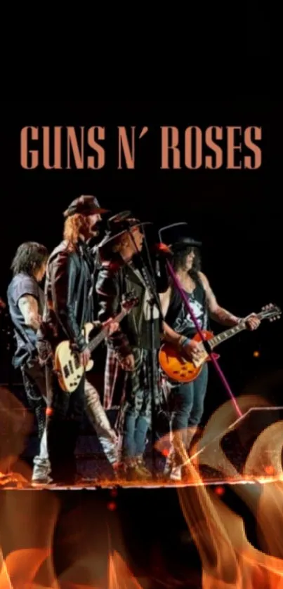 Guns N' Roses band performing live on stage with instruments.