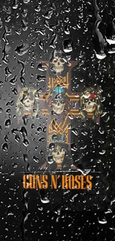 Guns N' Roses wallpaper with skulls on a dark background and cross design.