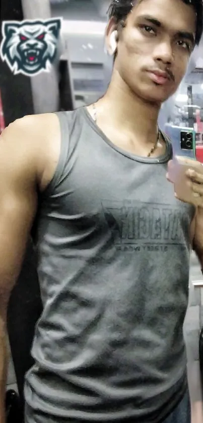 Gym enthusiast in a tank top, ready for workout.