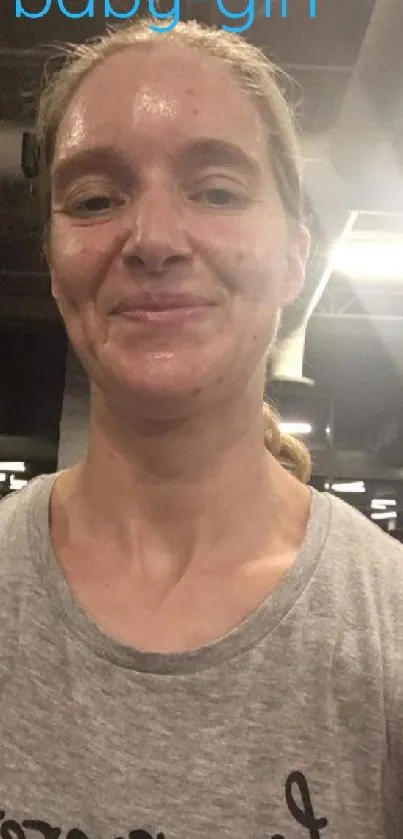 Fit woman at the gym with 'baby-girl' text overlay.