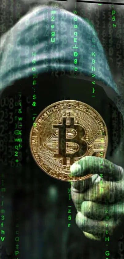 Hooded figure holds Bitcoin in digital code background wallpaper.